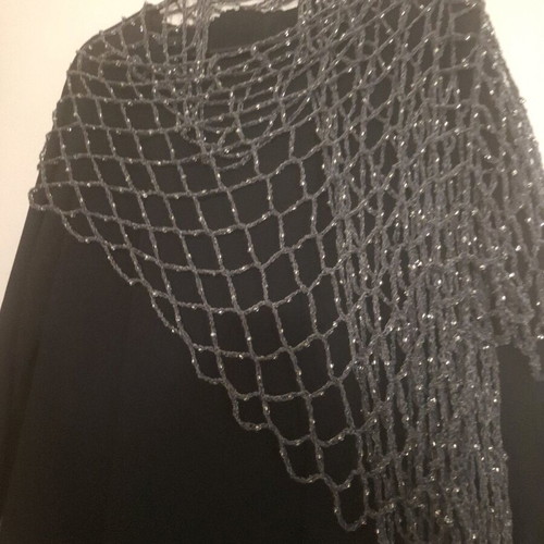 Knitted perforated scarf grey like new with beads