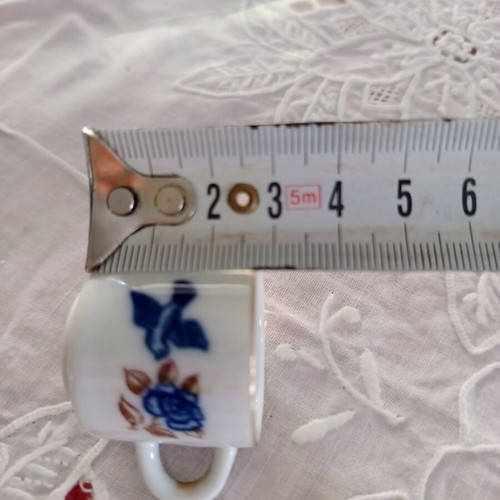 Vintage porcelain miniature set cup and saucer I Love You with gold trim like new