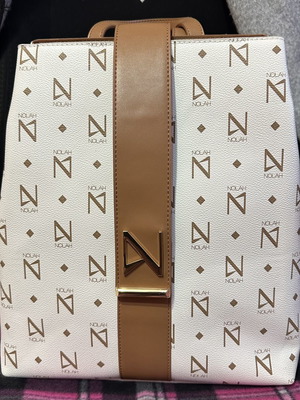 Nolah backpack like new, white and gold