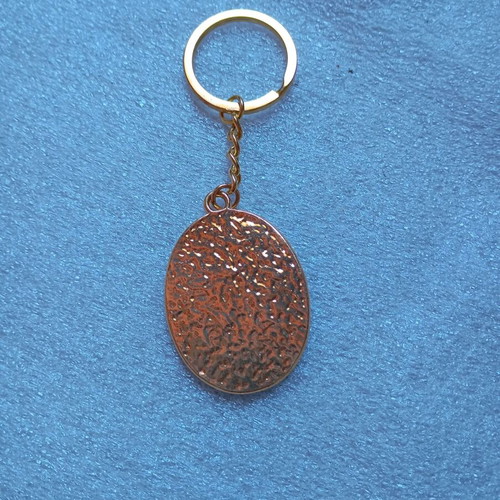 Metal keychain Patousakia new with ciel and gold enamel