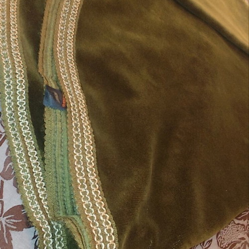 Velvet round tablecloth in olive green with gold border used