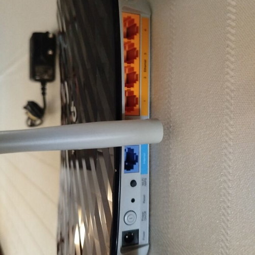 TP-Link Archer C20 router with 3 external antennas