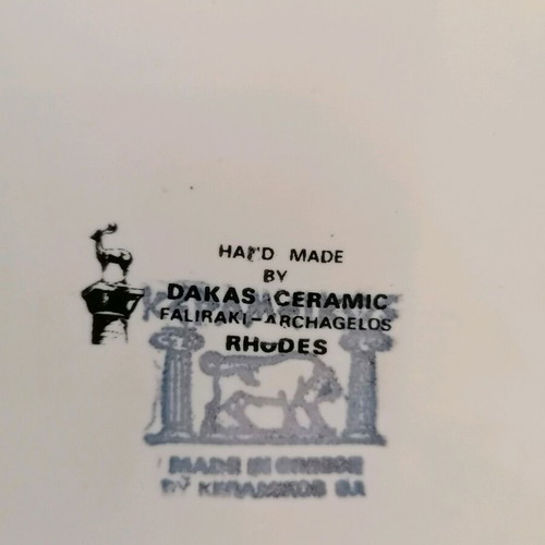 Ceramic wall plate used with gold details