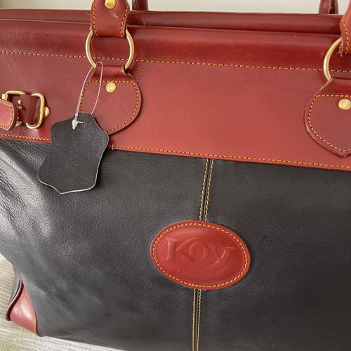 Travel bag 55 40 20 new, leather black and red