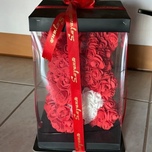 Teddy bear with flowers new for gift