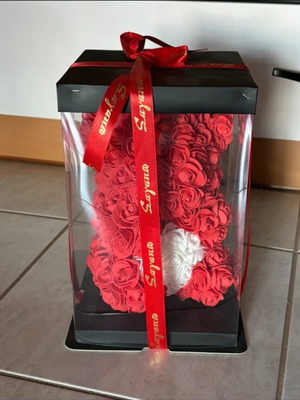 Teddy bear with flowers new for gift