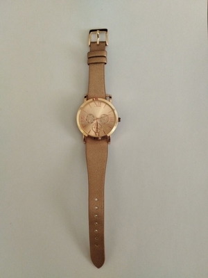 Watch in rose gold with analog dial like new