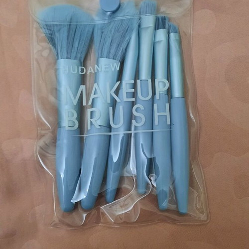 Cosmetics new, blush and eyeshadow palettes, brushes and nude lip pencil