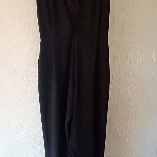 ST black one-piece jumpsuit like new official