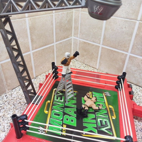 WWE Money in the Bank case with figures and accessories