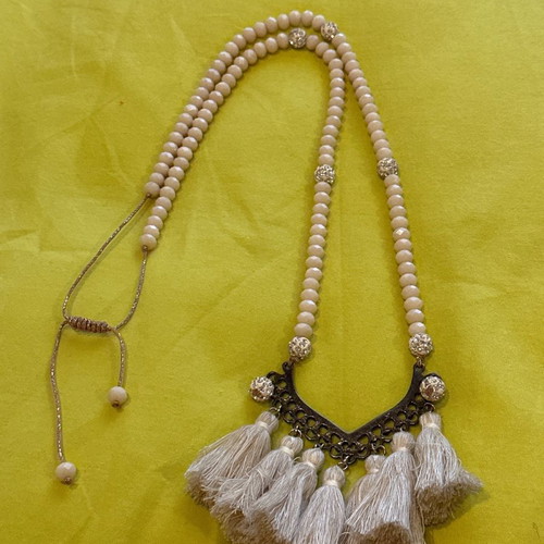 Long necklace used handmade beige with tassels