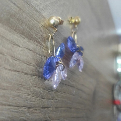 Dangling earrings like new with purple and gold elements