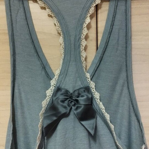 Regalinas blouse used with lace and bow in gray