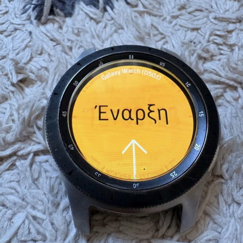 Samsung Galaxy Watch 46mm used with charger and 4 straps