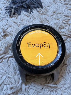 Samsung Galaxy Watch 46mm used with charger and 4 straps