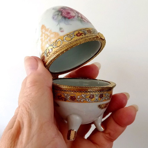 Porcelain egg like new with roses