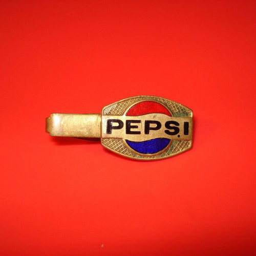 Vintage brass clip Pepsi used