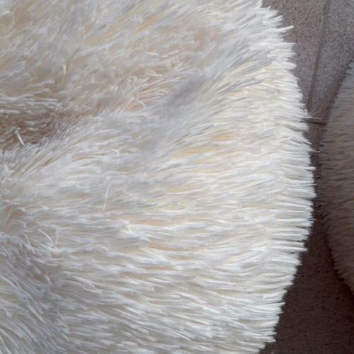 Set of 2 white fur pouf stools used