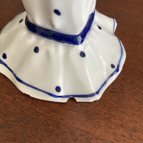 Vintage porcelain candlestick with blue bows and dots, used, damaged