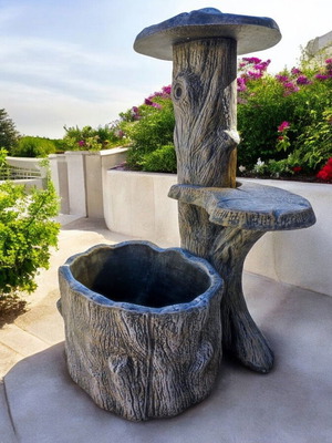 Isabella garden concrete fountain in black with beige and white