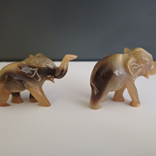 Carved elephant figurines used, set of two, missing tusks