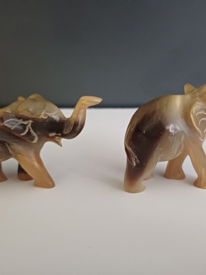 Carved elephant figurines used, set of two, missing tusks