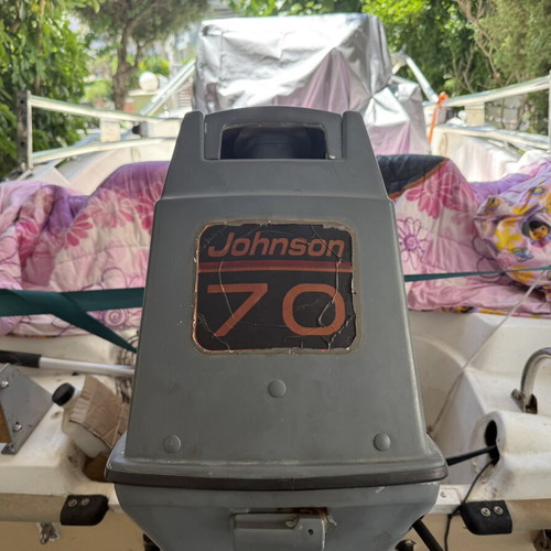 Johnson 70 hp outboard motor used with accessories