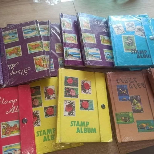 Stamp album new, 8 leaves, 16 pages