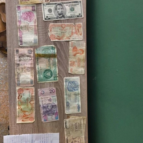 Collection of used Greek and Cypriot banknotes including drachmas and pounds