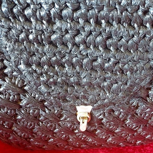 Handmade black raffia handbag used with silver turn-lock clasp