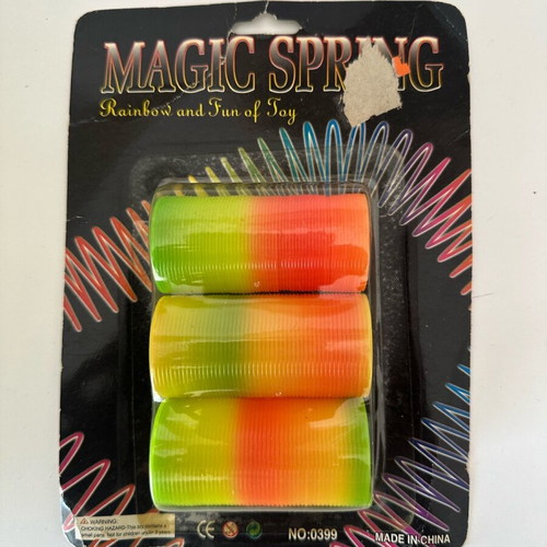 Magic spring rainbow toy new, sealed with small tear
