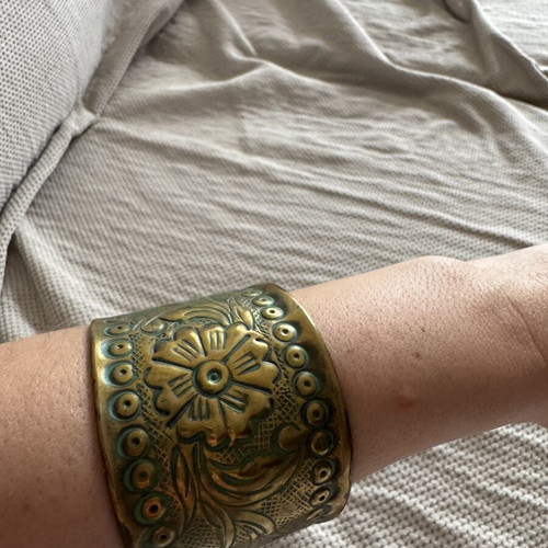 Vintage wide brass cuff bracelet with embossed floral pattern, like new
