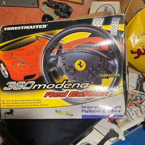 Video game steering wheel with Ferrari pedals and PlayStation One like new