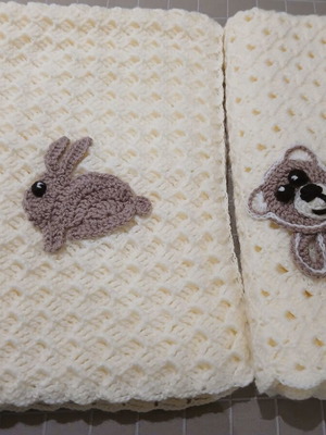 Handmade baby blanket decorated with animals, new