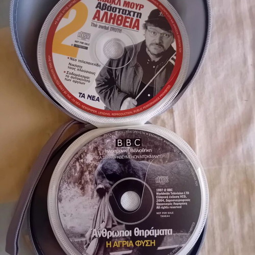 DVD collection like new, pack of 33 with movies, documentaries, and shows