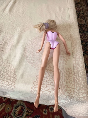 Barbie doll used