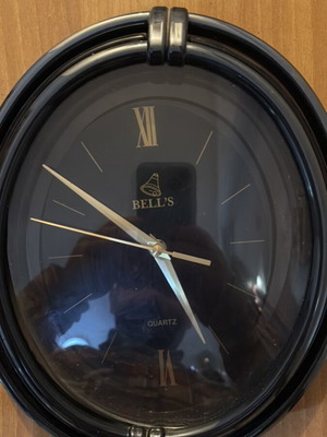 Vintage Bell’s wall clock black like new