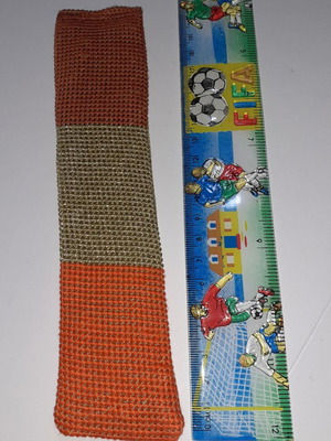 Handmade bookmark with dark orange, light gold and dark red colors
