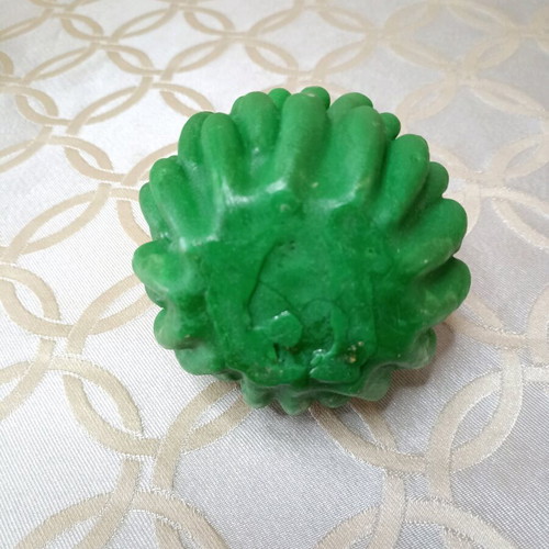 Green and ecru flower-shaped candle new