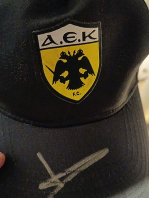 AEK Cap with Ilioupoulos Signature new, authentic