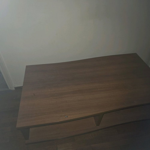 Wooden TV stand used with shelf