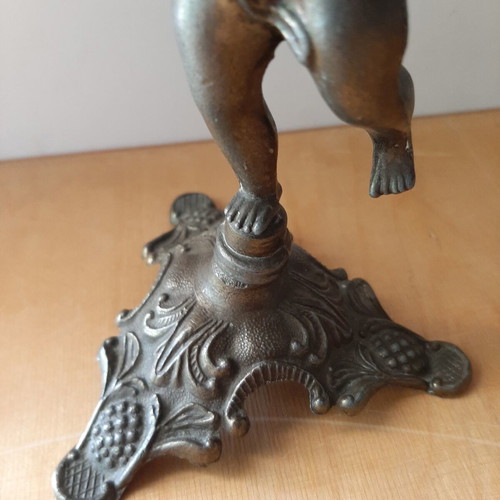 Vintage metal candlestick with boy figure like new