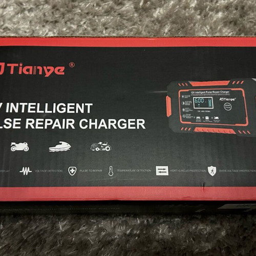 Car and motorcycle battery charger 12V new unused