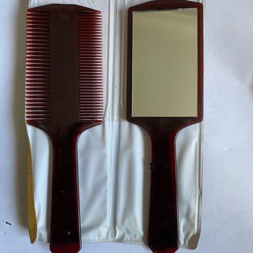 Vintage comb and hand mirror set new, collectible