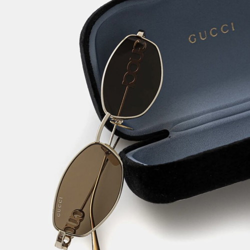 Gucci women's sunglasses GG1802S 005 with gold metal frame and brown lenses new