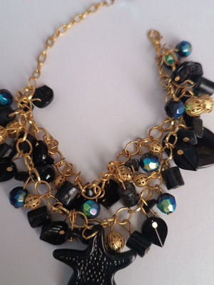 Gold bracelet with black charms and holographic design new