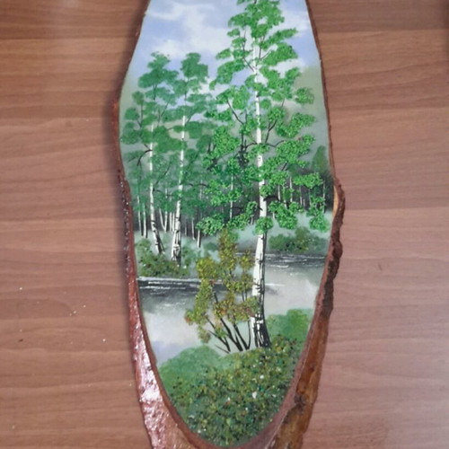 Petroglyph on linden wood like new with precious stones