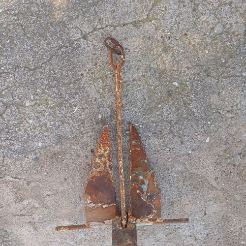 Anchor used for small boat, old and rusty