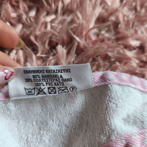 Baby bib "O kosmos tou moro" like new, white with pink details