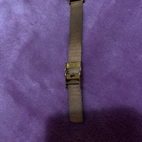 Daniel Wellington women's watch used with gold bracelet